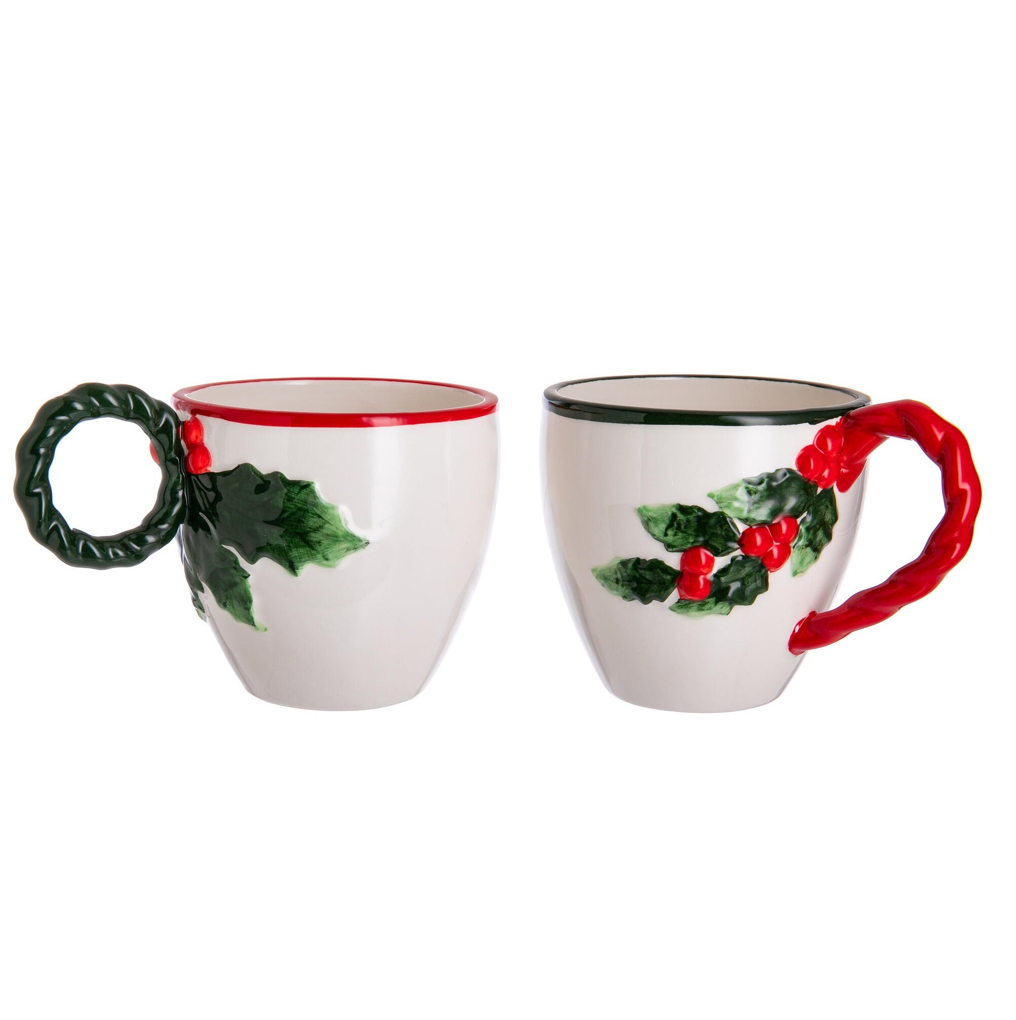 Two ceramic mugs with holly design on a white background