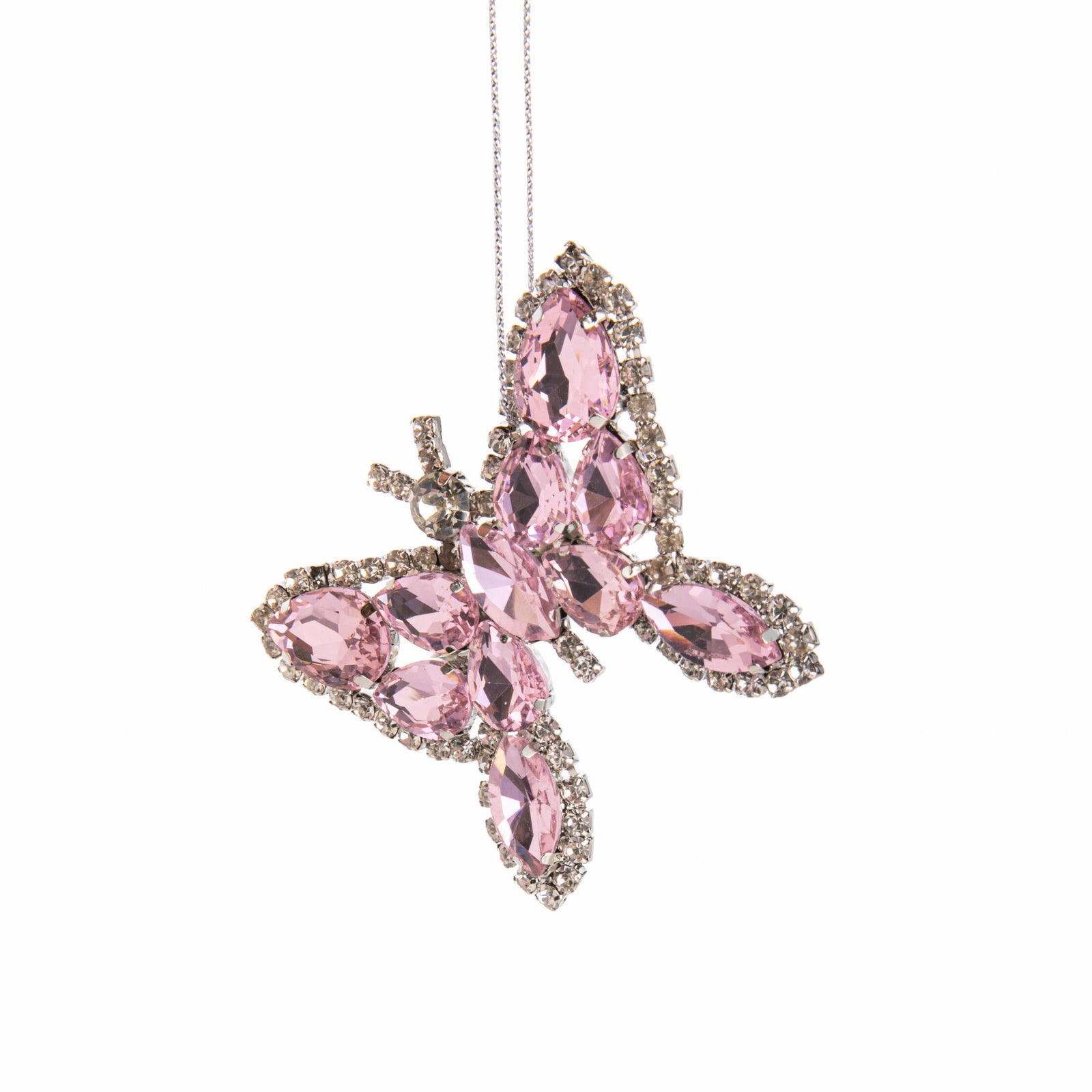 Pink butterfly ornament with gemstones on a white background