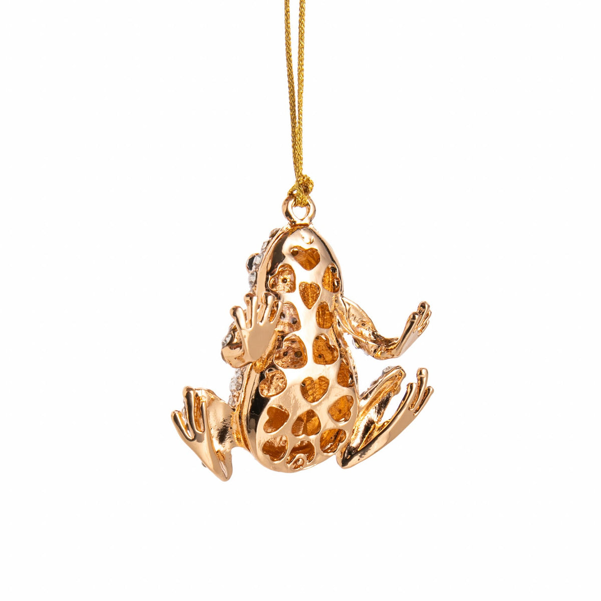 Gold frog ornament on a white background