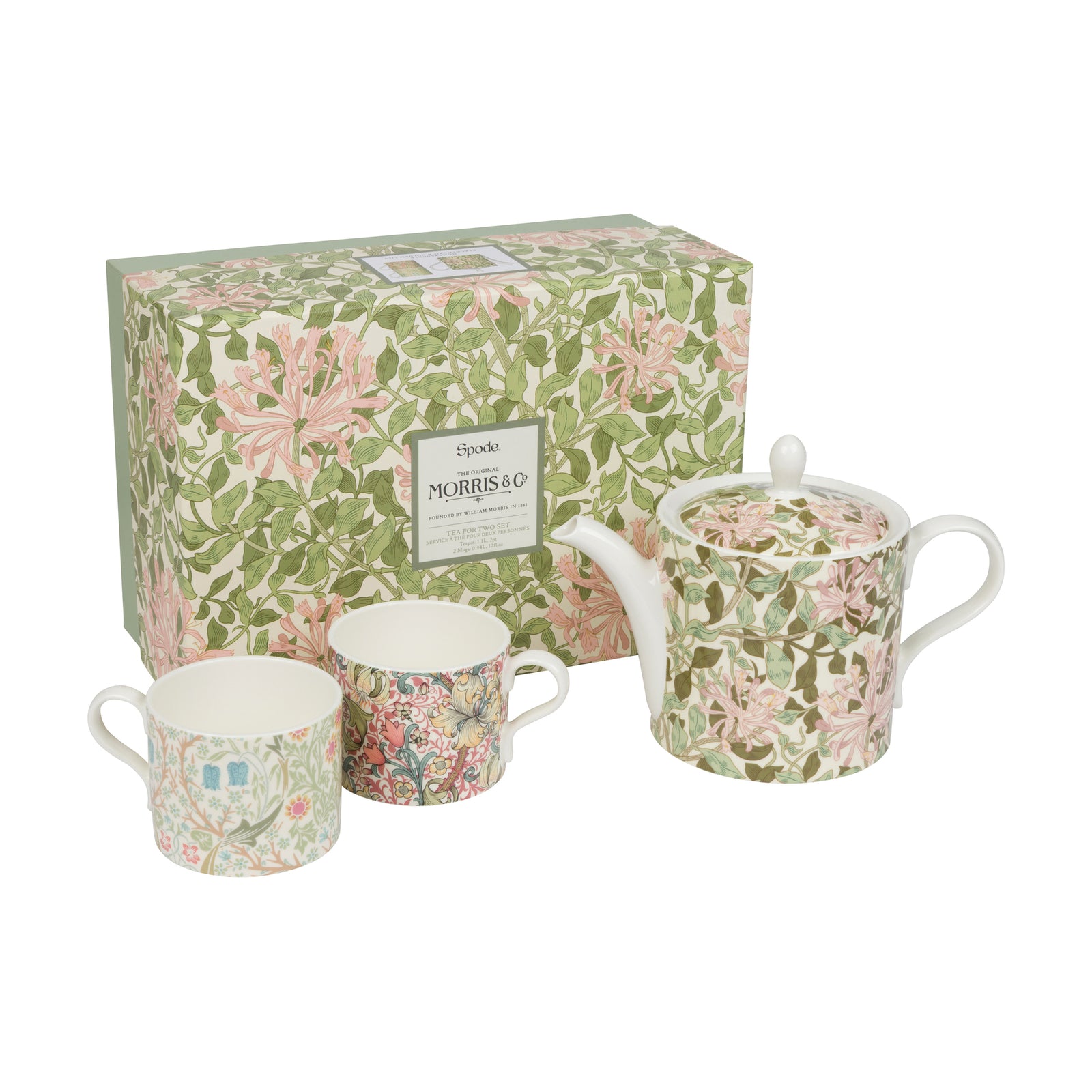 Tea set with Morris & Co floral patterns including a teapot, cups, and a box on a white background