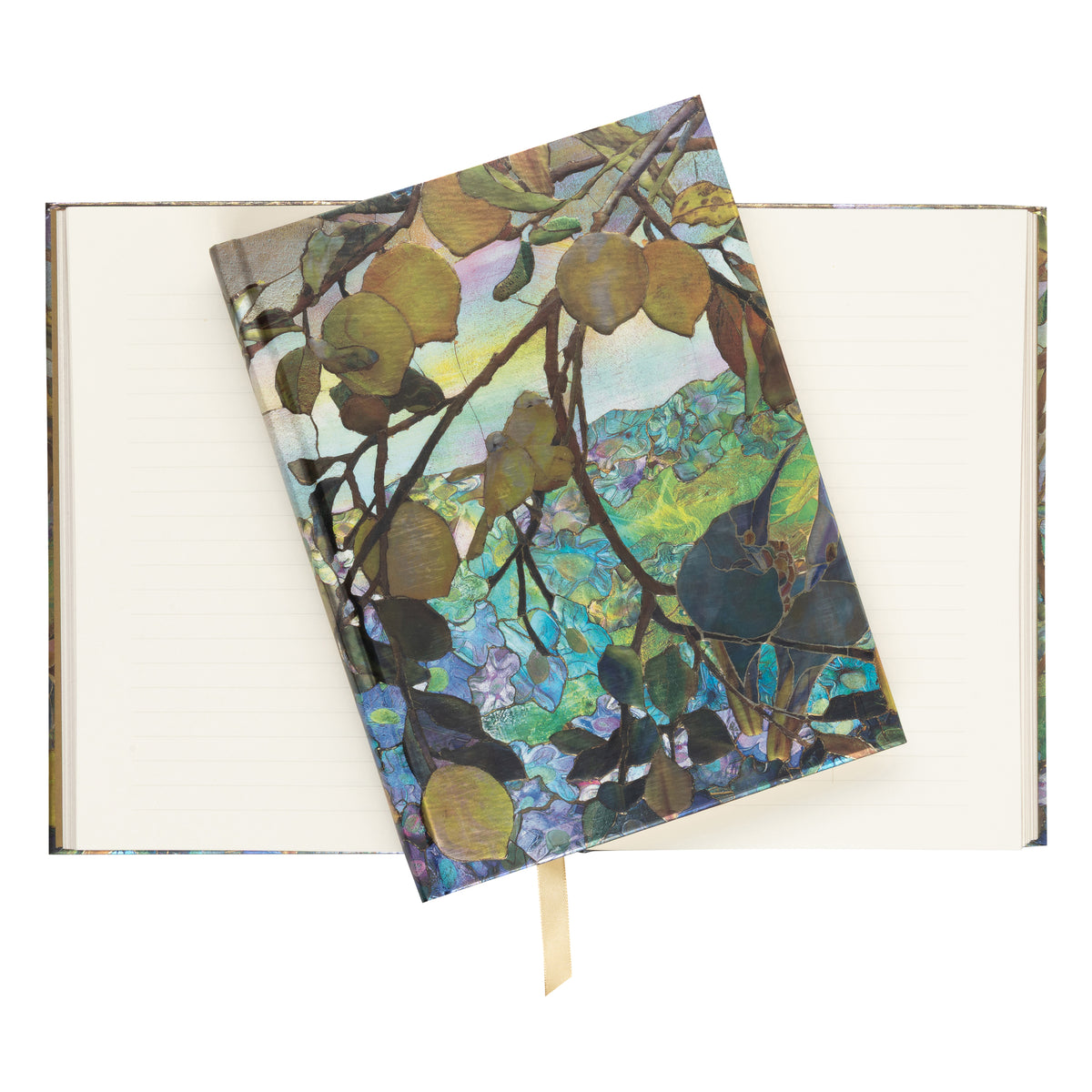 An open notebook with lined cream pages, featuring a decorative hardcover on the front with an artistic illustration of tree branches, leaves, and colorful abstract background details. A small ribbon bookmark hangs from the bottom edge.