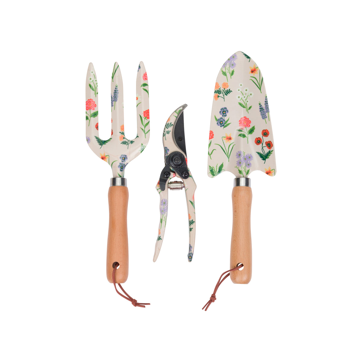 Three gardening hand tools with floral enamel handles and blades, including a garden fork, pruning shears, and trowel, shown on a plain white background.