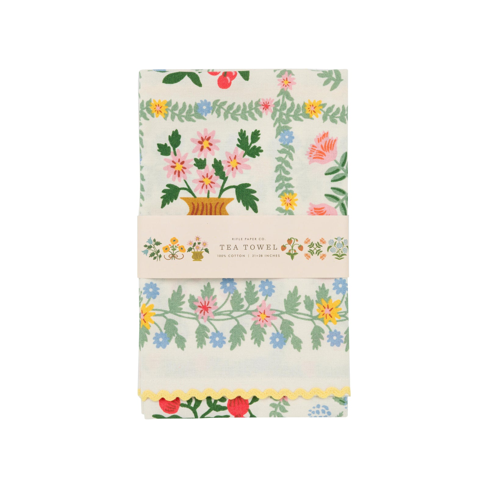 Quilt with floral and geometric patterns on a white background