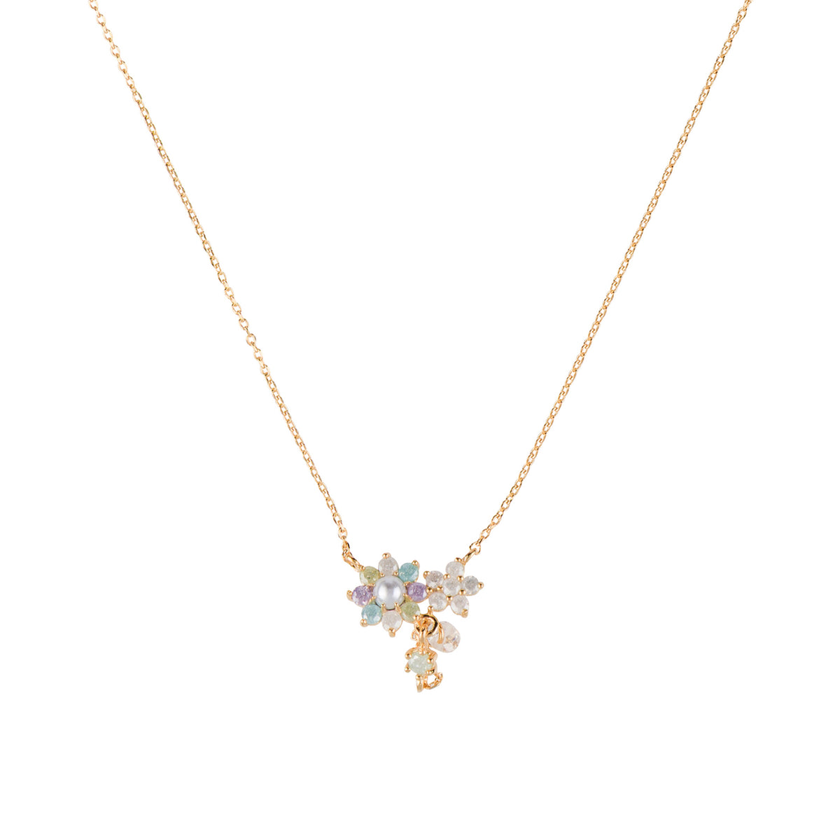A delicate gold chain necklace featuring a small floral cluster pendant with iridescent, pastel-colored rhinestones on a solid white background.