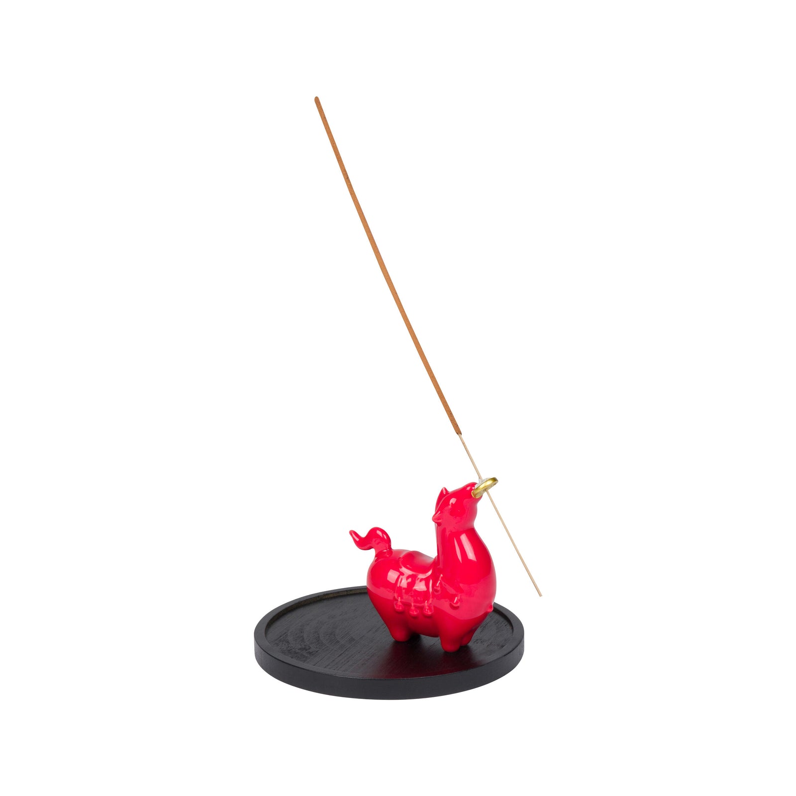 Red ceramic horse incense holder on a black stand with a white background