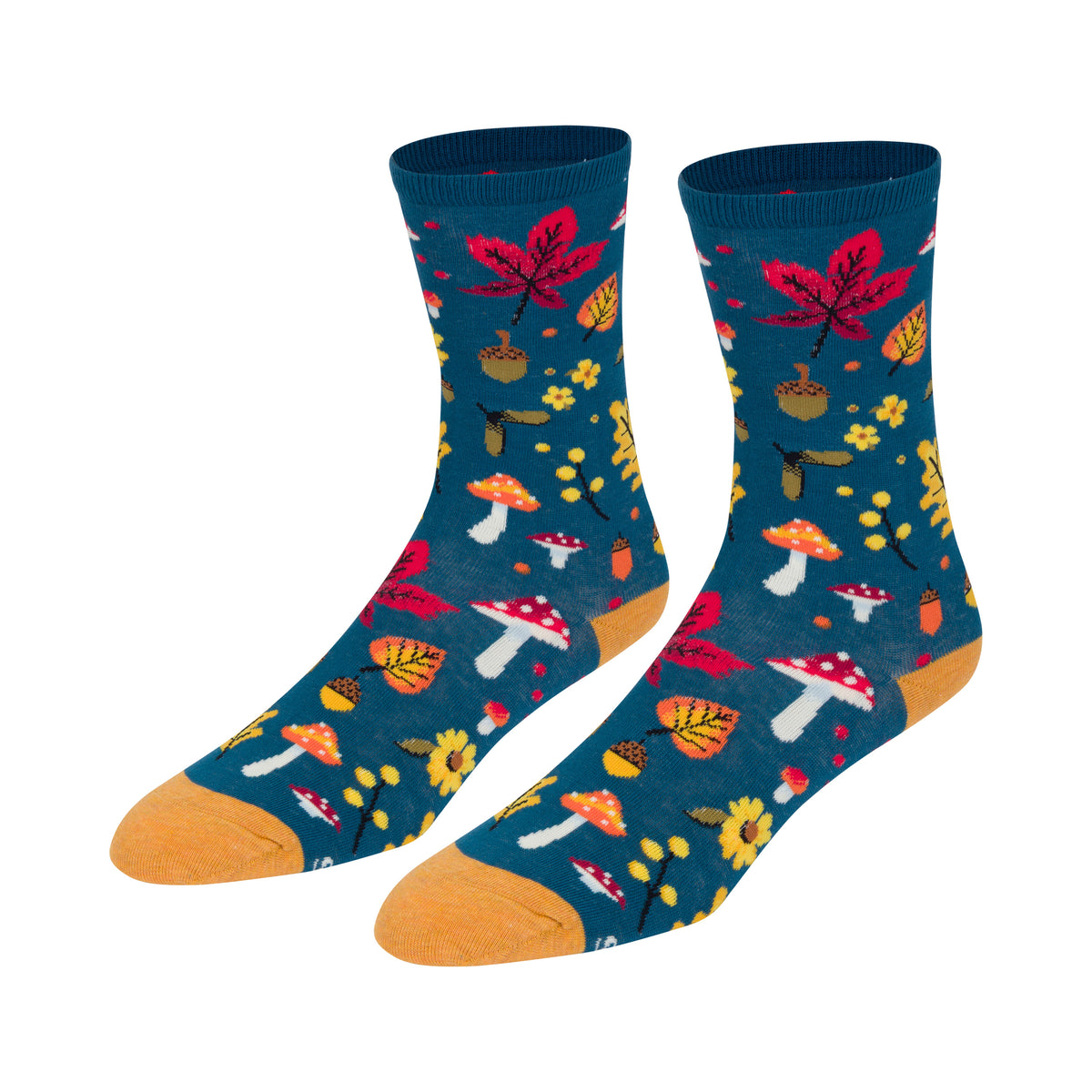 Crew socks with a dark blue background featuring an autumn-themed pattern of red and yellow mushrooms, red and yellow leaves, acorns, and small yellow flowers, with solid yellow toes and heel.