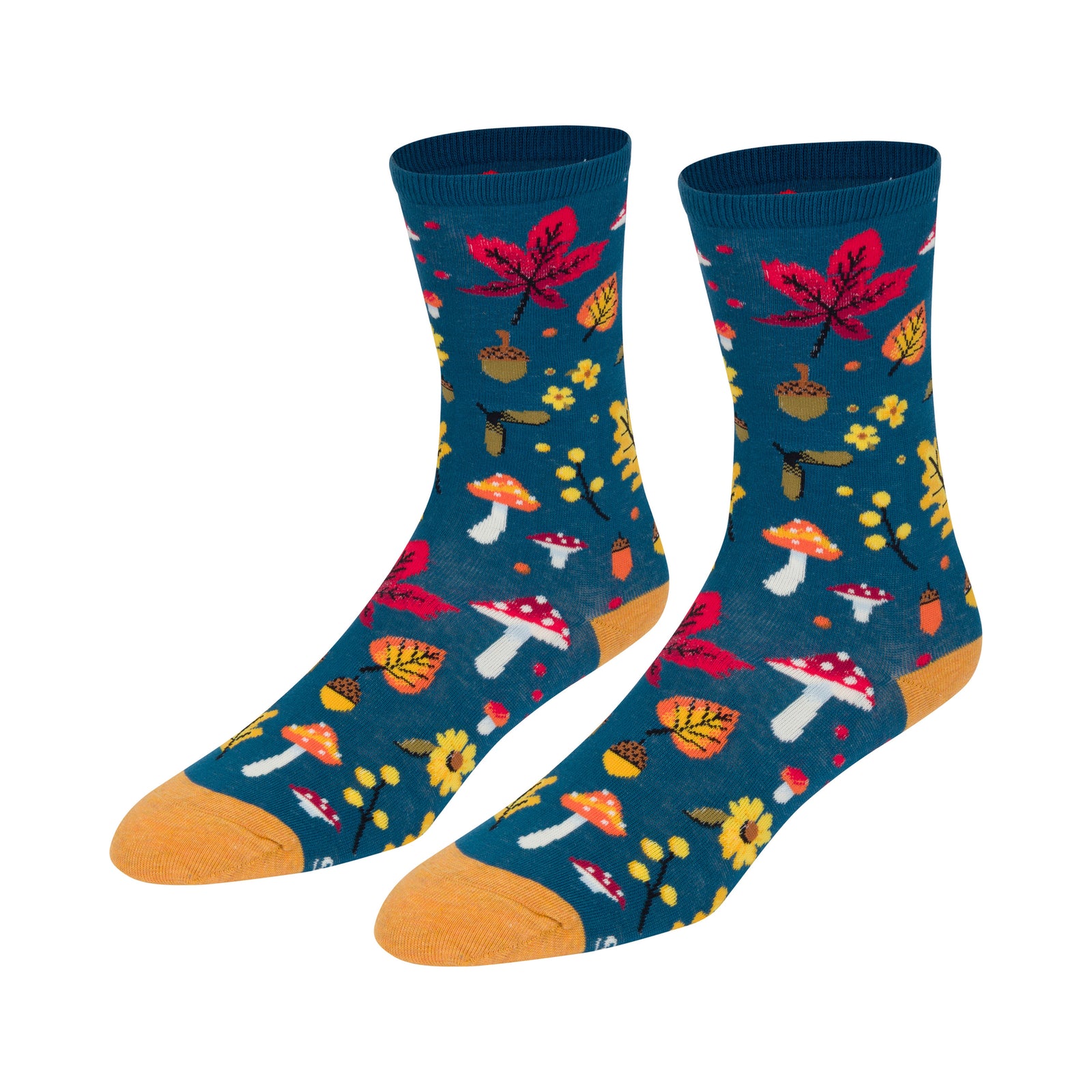 Crew socks with a dark blue background featuring an autumn-themed pattern of red and yellow mushrooms, red and yellow leaves, acorns, and small yellow flowers, with solid yellow toes and heel.