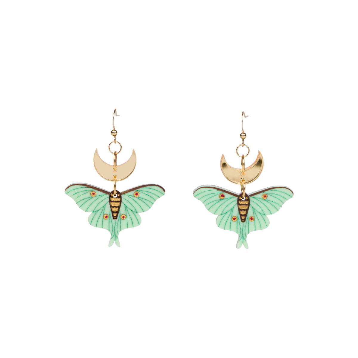 A pair of dangling earrings featuring mint green moth wings with gold and black striped details, suspended from gold crescent moon and star charms on gold hooks, shown against a plain white background.