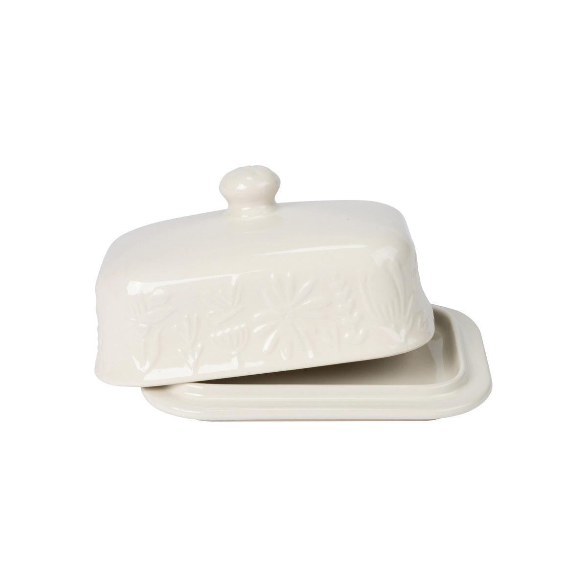 White ceramic butter dish with lid on a white background