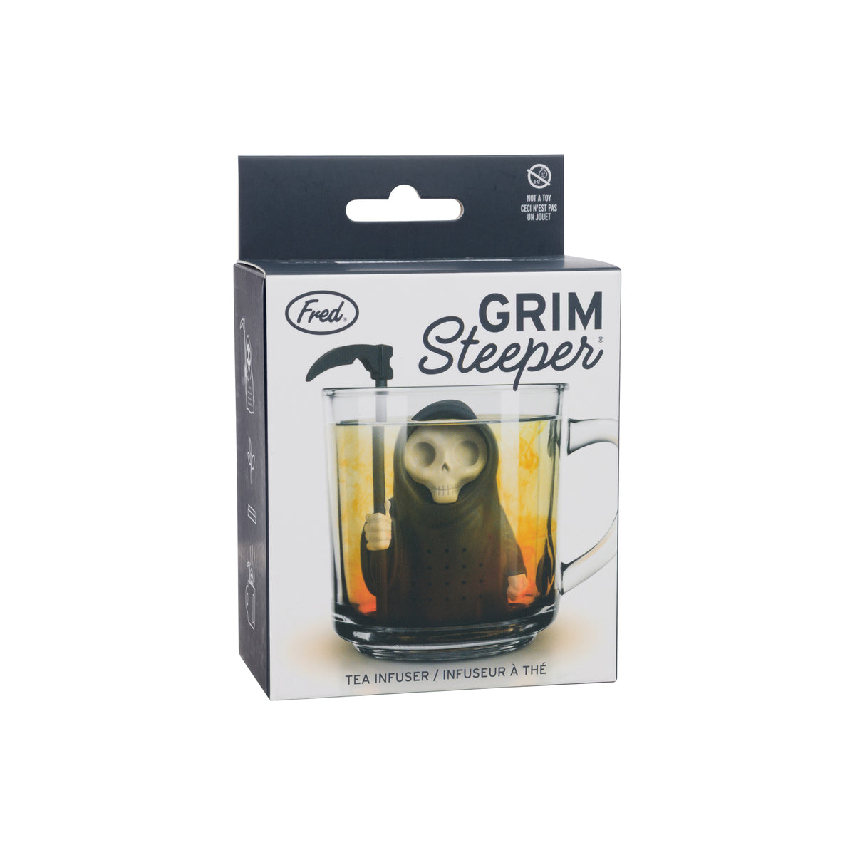 Fred Grim Steeper tea infuser in its retail packaging, featuring a grim reaper figure inside a clear glass mug on the front of the box.