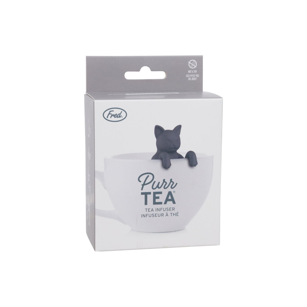 A boxed tea infuser shaped like a black cat sitting on a white teapot, shown in its retail packaging against a plain white background.