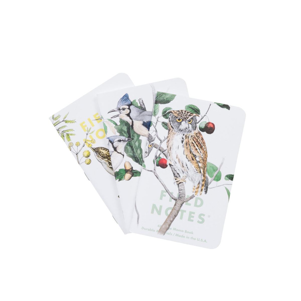 Three pocket-sized notebooks with illustrations of birds on a white background