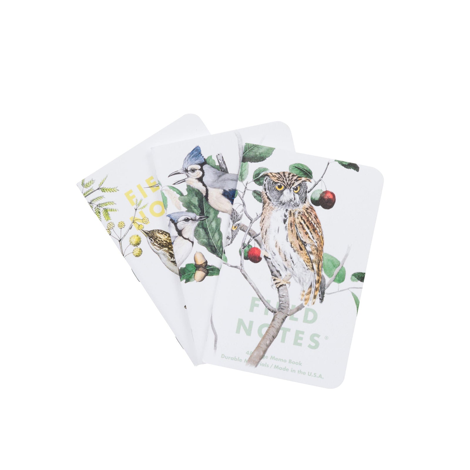 Three pocket-sized notebooks with illustrations of birds on a white background