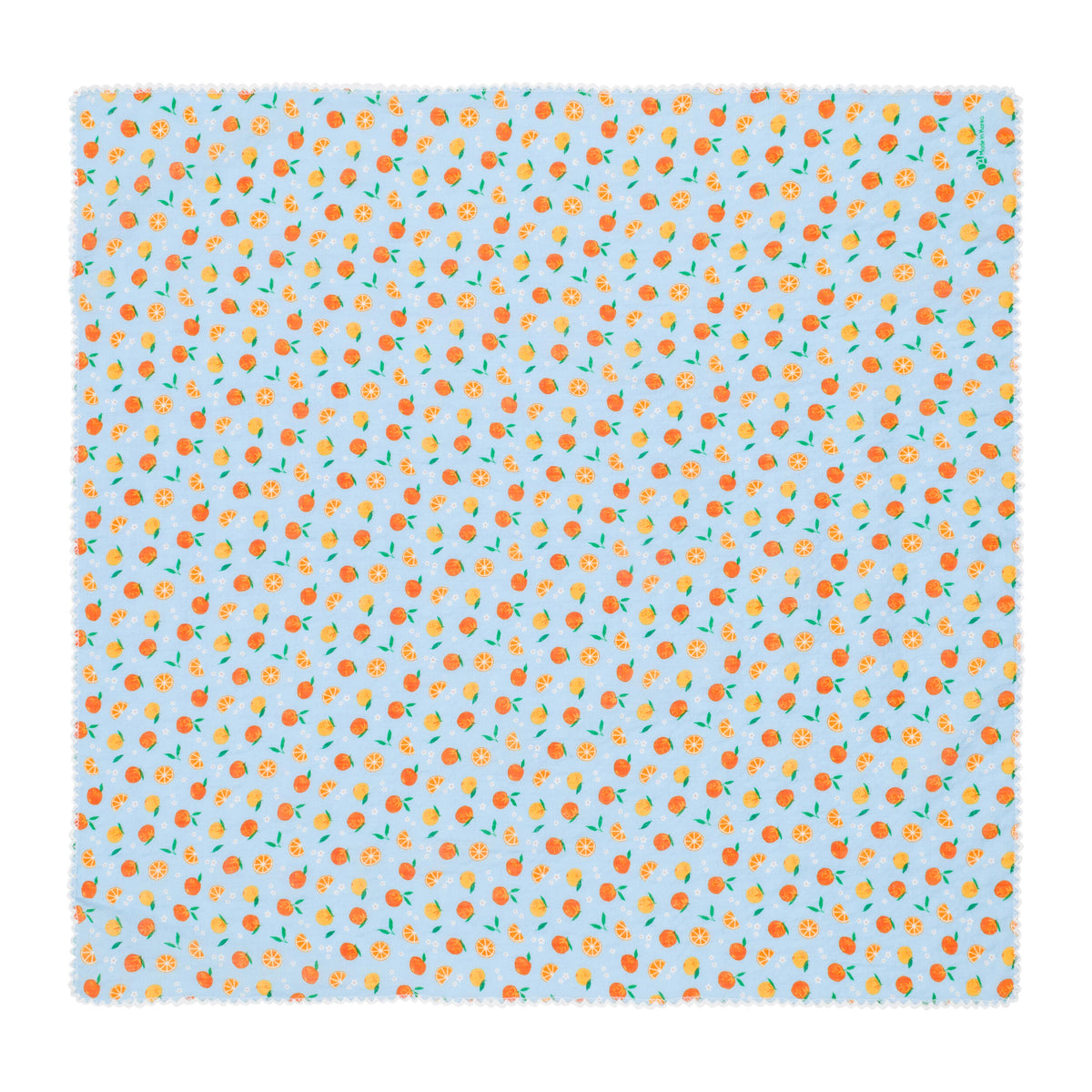 Patterned fabric with small orange shapes on a light blue background