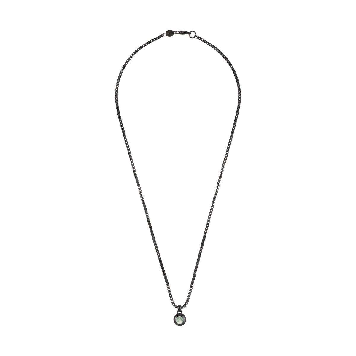 A dark gunmetal chain necklace with a small round bezel-set light green stone pendant, displayed on a clean white background.
