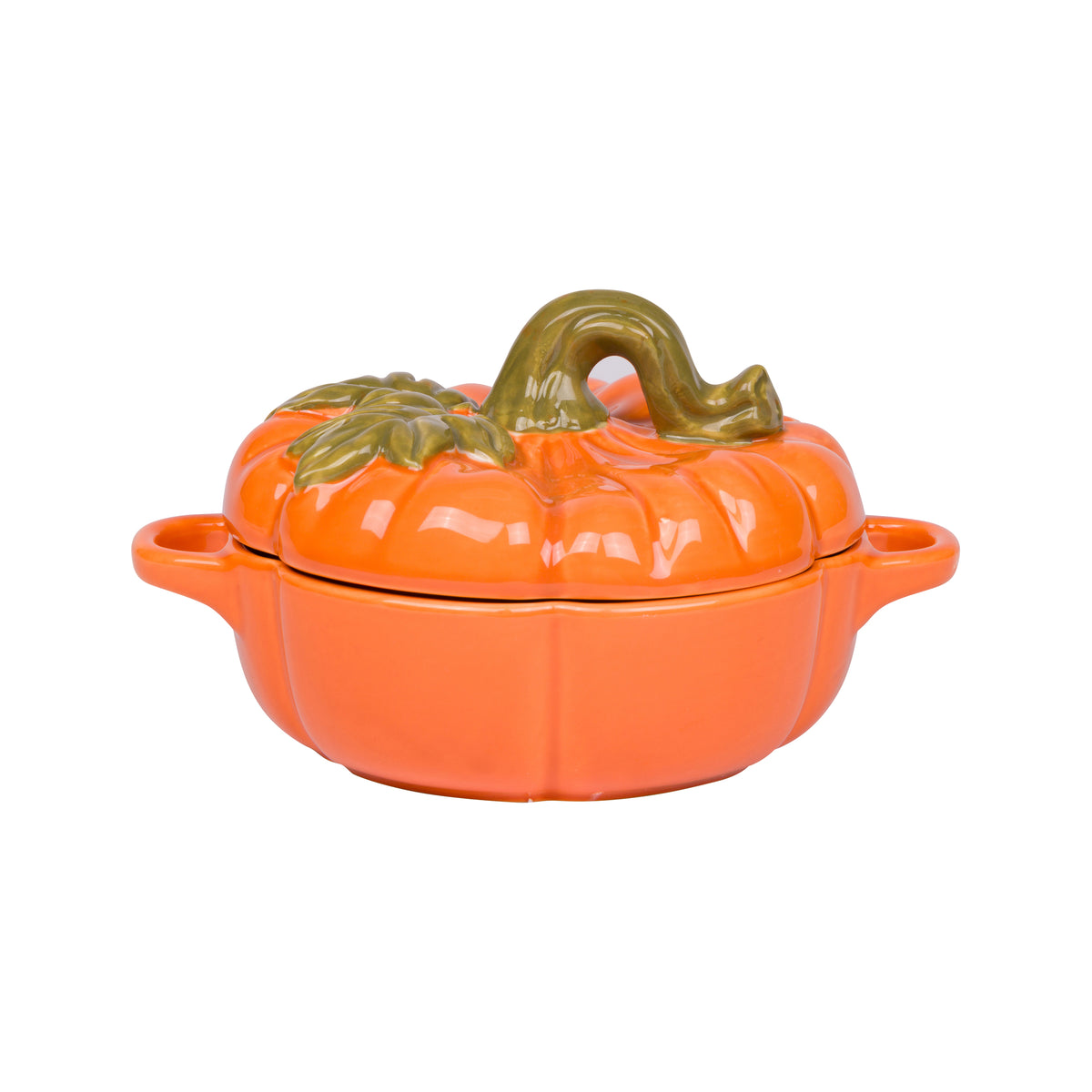 An orange pumpkin-shaped ceramic lidded casserole dish with a sculpted green stem and leaves on top, shown on a plain white background.