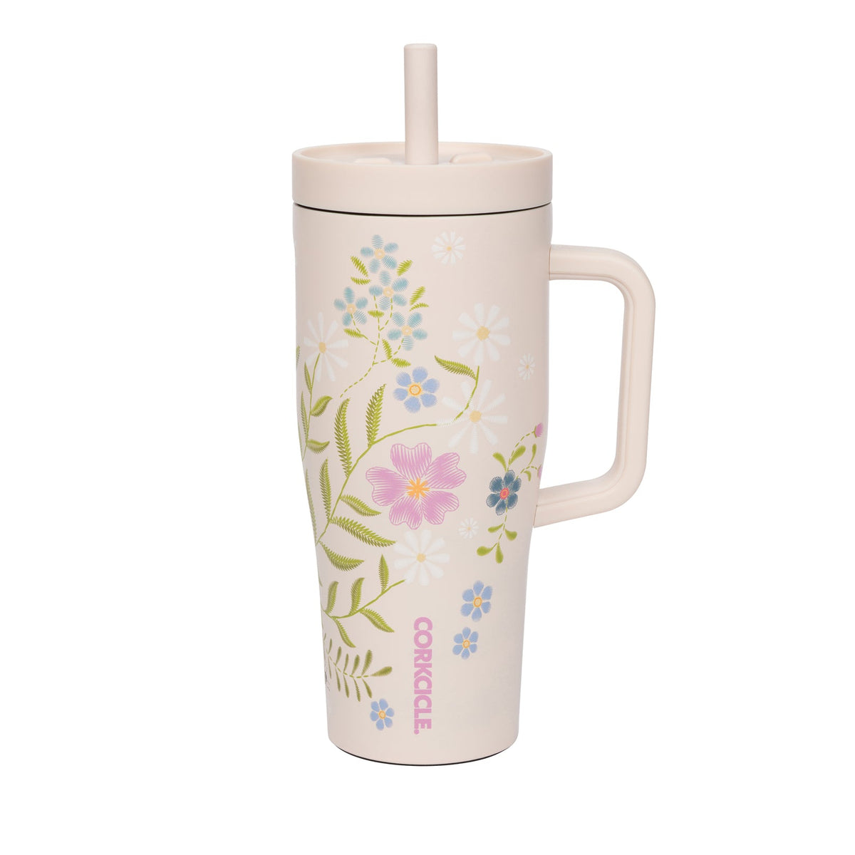 A tall, cream-colored handled tumbler with a matching lid and straw, decorated with a delicate floral pattern in pink, blue, and green. The brand name 'CORKCABIN' is printed vertically near the bottom.