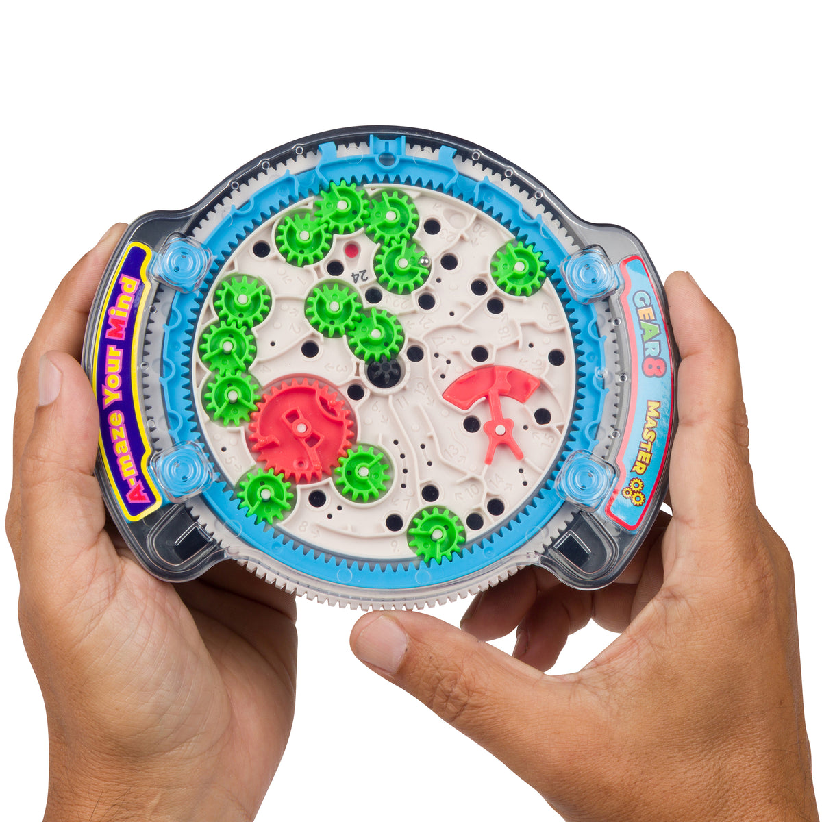A hands-on view of a circular mechanical toy with gears, magnets, and colorful plastic parts, held by two hands against a plain white background.