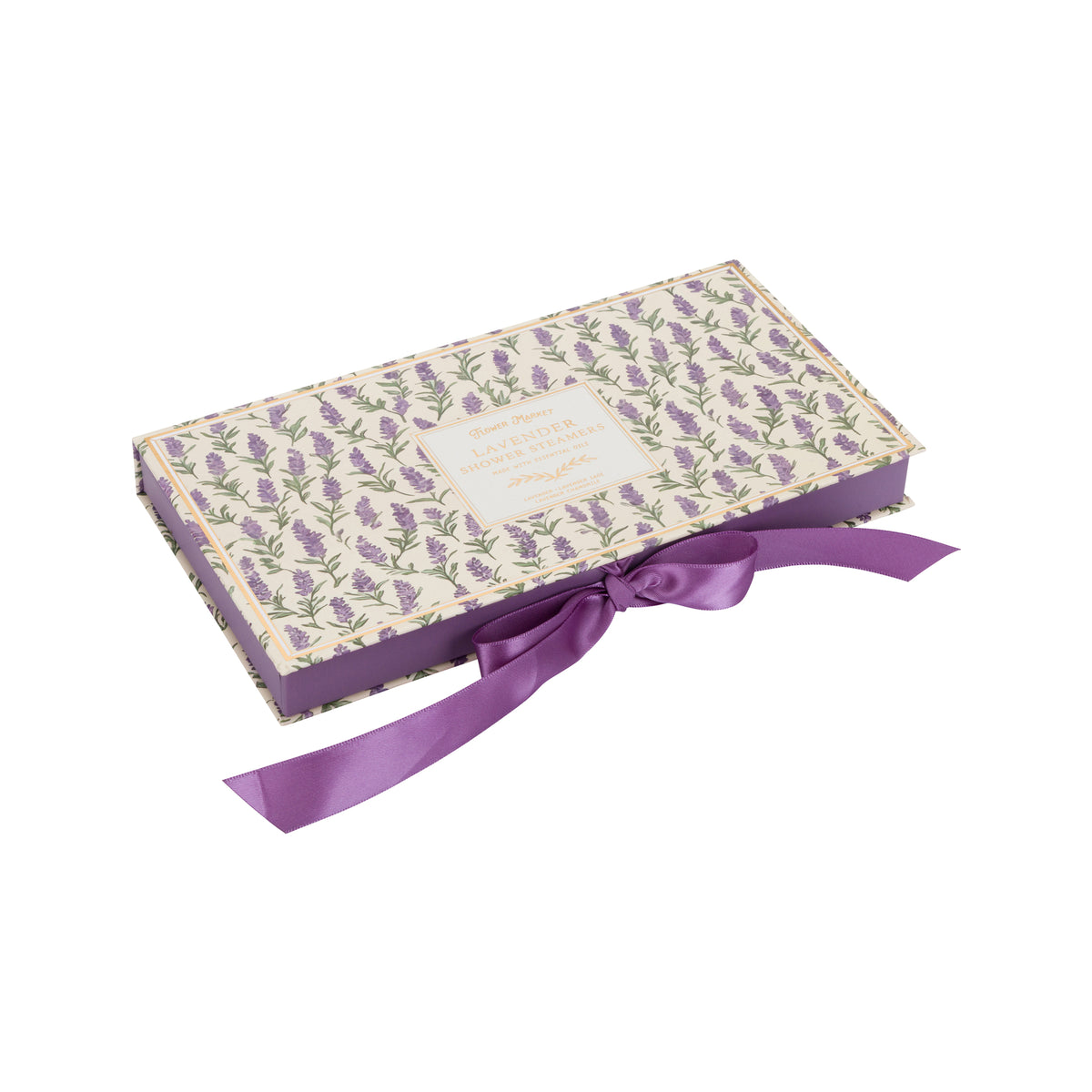 Lavender and Vanilla shower steamer gift box with a purple floral pattern, a cream-colored label, and a purple satin ribbon bow, shown on a plain white background.