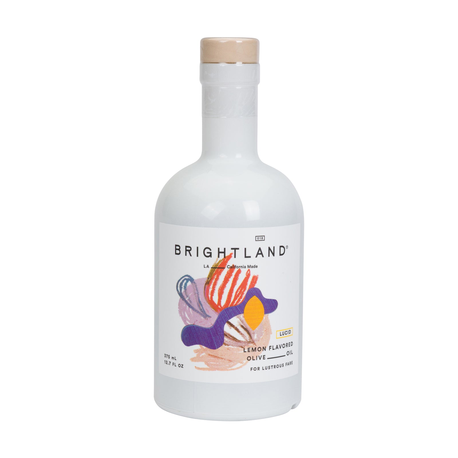 Brightland Lemon Flavored Olive Oil in a white bottle with a light wood-toned cap, featuring a colorful abstract label.