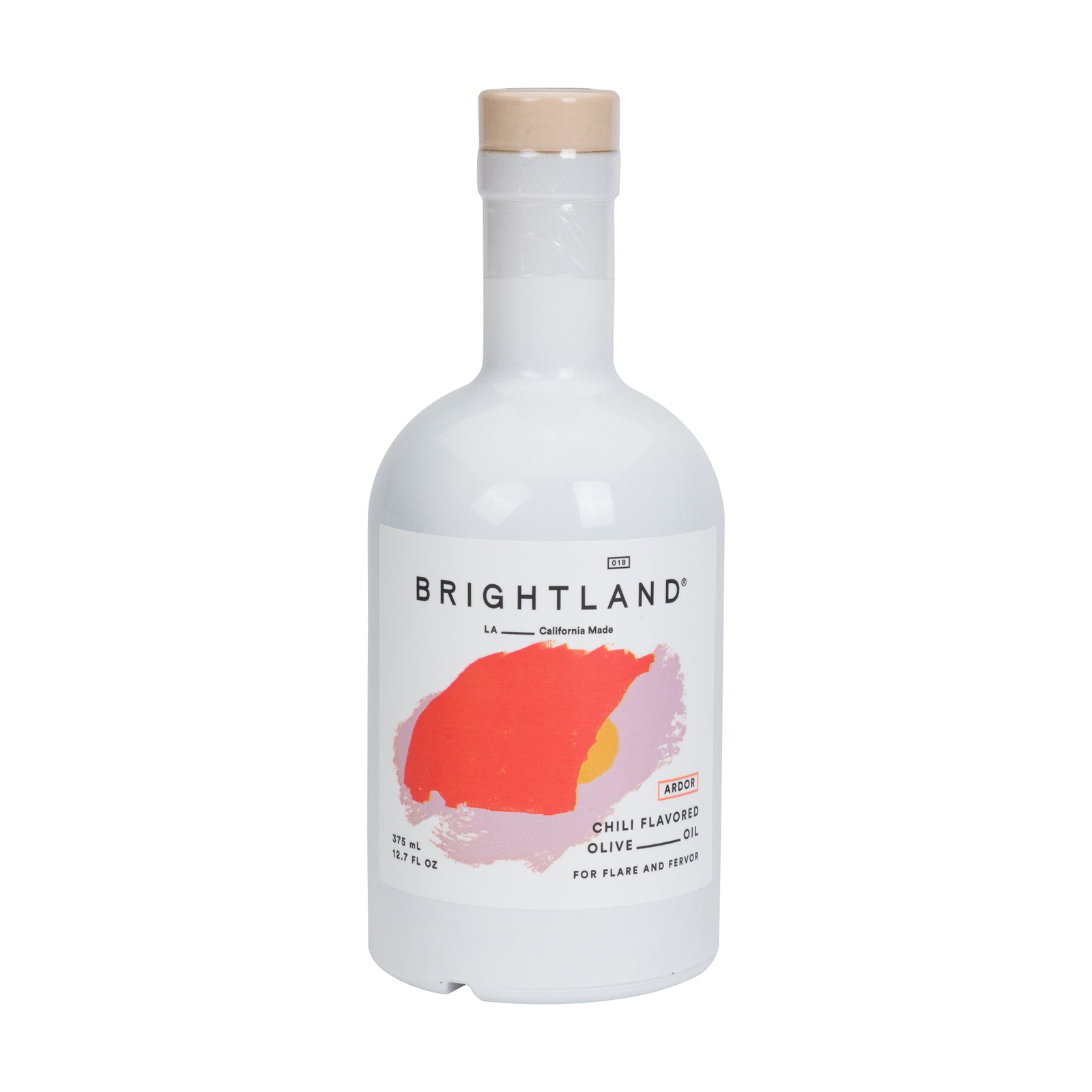 Brightland Chilli Flavoured Olive Oil in a white bottle with a light wood cap, featuring a colorful orange and pink label on a white background.