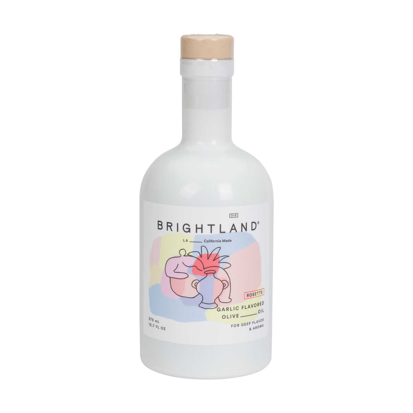A white glass bottle of Brightland Garlic Flavored Olive Oil with a light wood cap and a colorful label featuring a stylized face illustration.