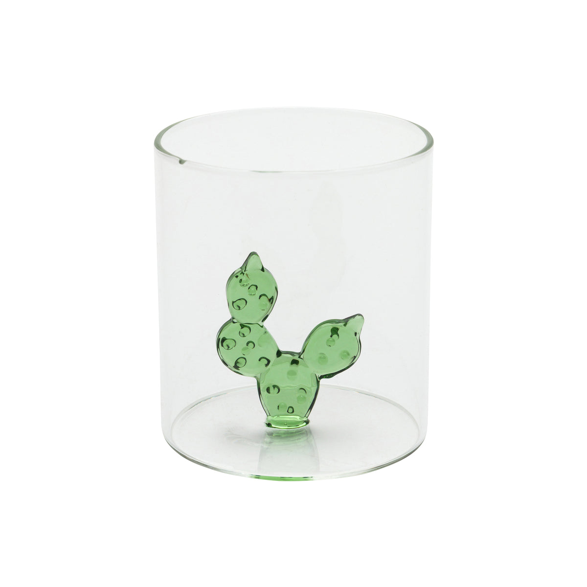 A clear cylindrical glass tumbler featuring a small, green, three-bud cactus decoration on the front, set against a plain white background.