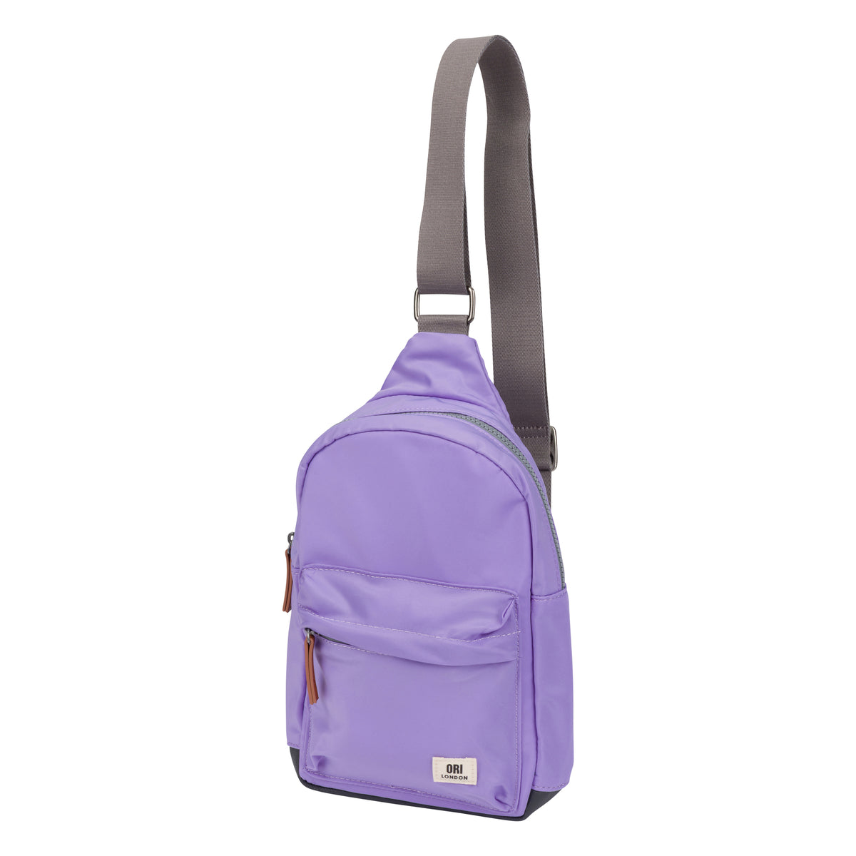 A light purple sling backpack with a gray adjustable shoulder strap, featuring a front zippered pocket and a small white brand label at the bottom.