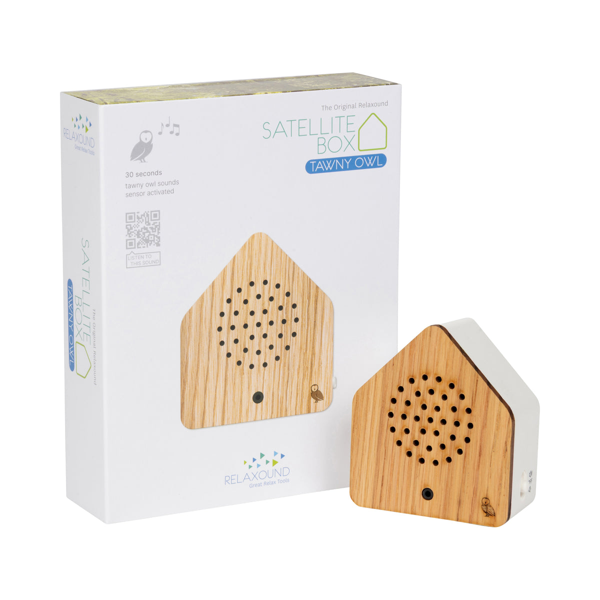 A house-shaped Tawny Owl bird sound speaker next to its white retail packaging box, featuring a natural wood grain front panel and a white side casing.