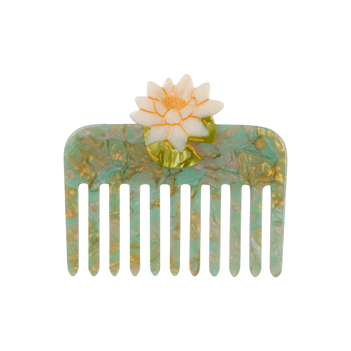 AN aqua marbled finish comb with a water lotus flower motif on a white background