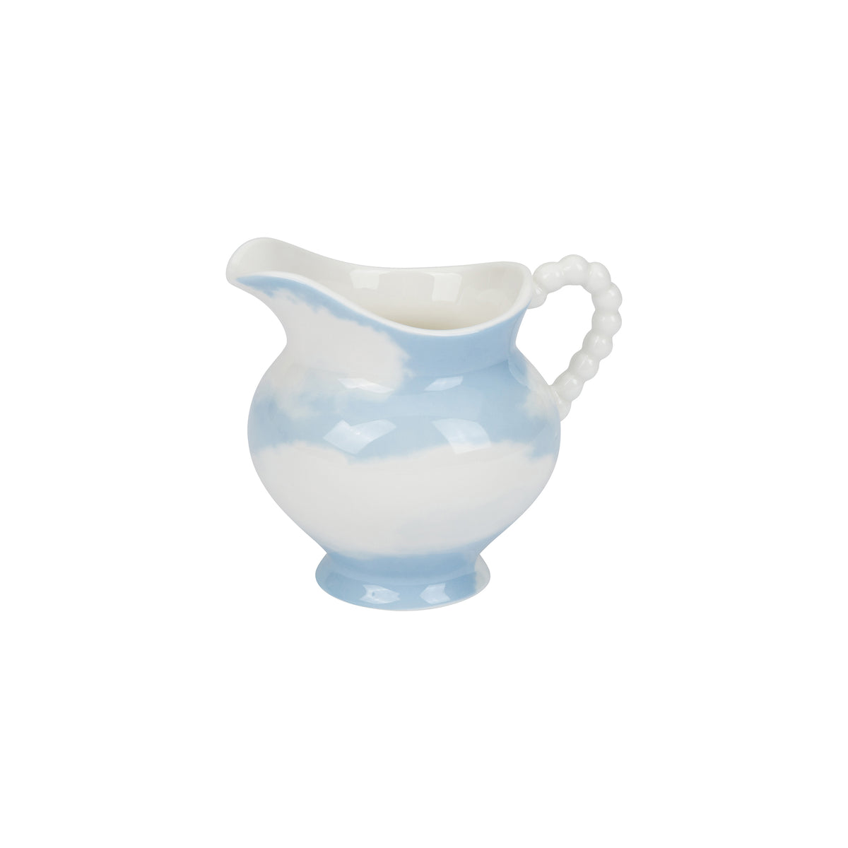 A small ceramic creamer pitcher with a white body, light blue marbled pattern, and a beaded handle, shown on a plain white background.