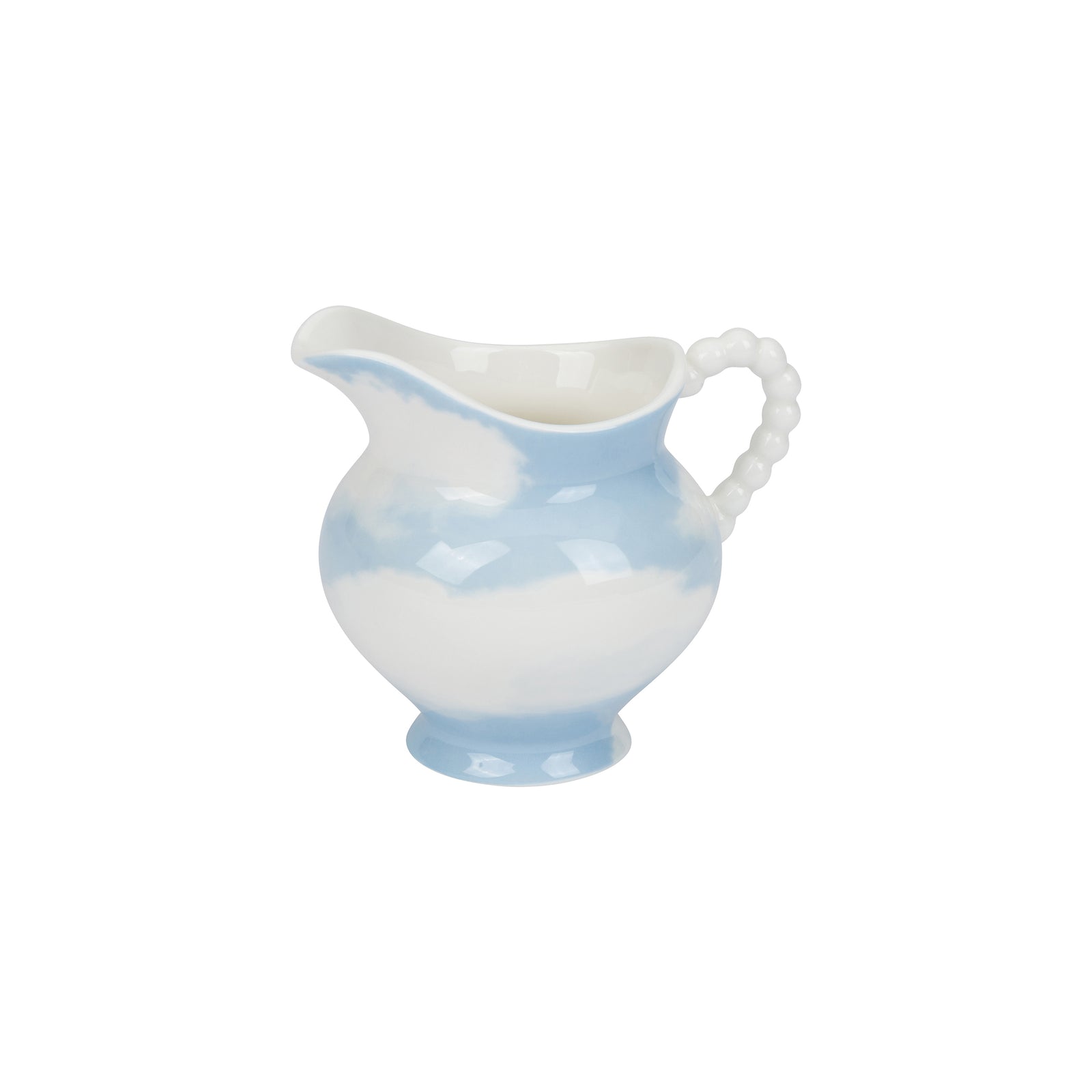 A small ceramic creamer pitcher with a white body, light blue marbled pattern, and a beaded handle, shown on a plain white background.