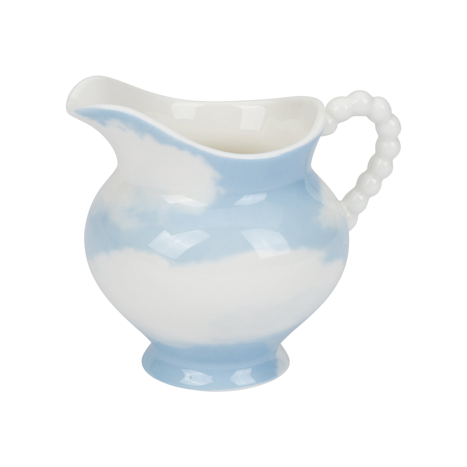A small ceramic creamer pitcher with a white body, light blue marbled pattern, and a beaded handle, shown on a plain white background.