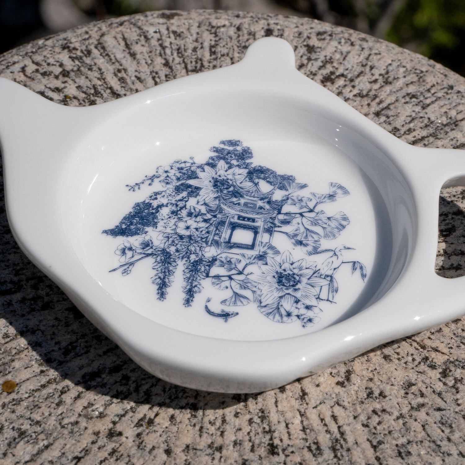 AVAILABLE SOON This delightful tea trivet is the prettiest catch-all for your teabags, teaspoons, tea leaves, and more! It features an excerpt from our exclusive Asian Gardens toile print. 