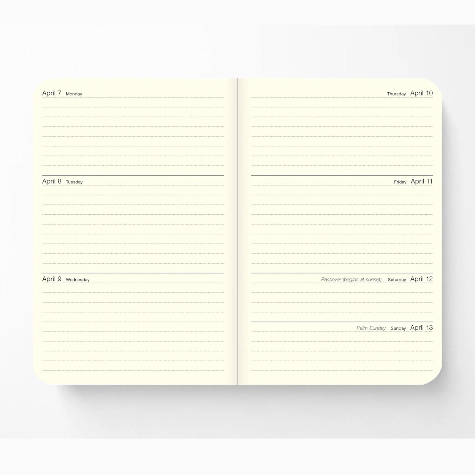 Notebook with butterfly illustrations and '2026' on a beige background