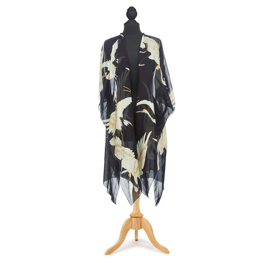 The perfect summer cover up, in a vintage Japanese style Heron print. This long, cardigan style kimono has a beautifully gauzy feel and is lightweight enough to fold up and pop in your purse, but also heavy enough to keep the chill off when the sun goes down. 50% Modal and 50% Viscose One size.  Measures 41" W x 44".