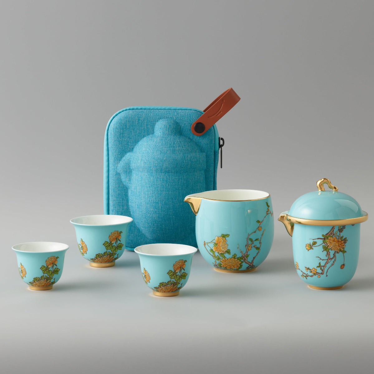 Inspired by the beautiful landscape of the West Lake in Hangzhou, China, this stunning six-piece teacup set is made from highly refined, premium, chip-resistant porcelain and is decorated with traditional Peony blooms on a glossy azure-blue base, accented with luxurious gold metallic. This set contains a lidded teapot, strainer cup, three teacups, and a travel case, allowing you to enjoy your favorite tea elegantly and perfectly infused at home or on the go.