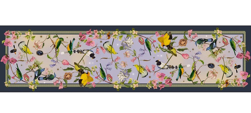 This beautiful, long-length scarf is a true wearable work of art. The vibrant print shows colorful birds, perched on branches and dancing around pink, lilac and ivory blossoms. This is the perfect scarf to carry in your purse as a quick cover-up. Dimensions: 19" x 72" Material: Silk satin polyester.