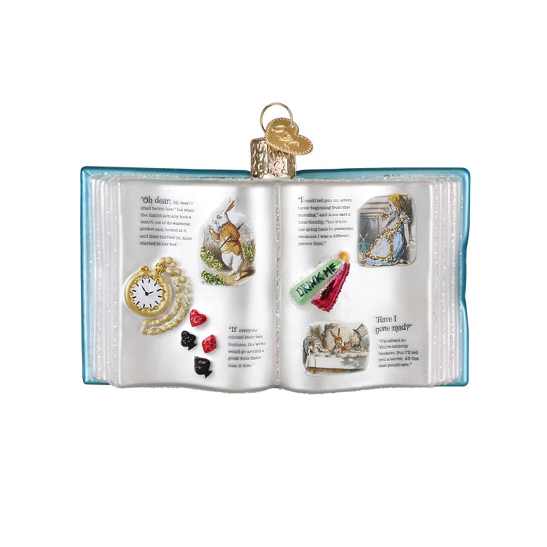 Decorative ornament shaped like an 'Alice in Wonderland' open book with various small figurines on a white background