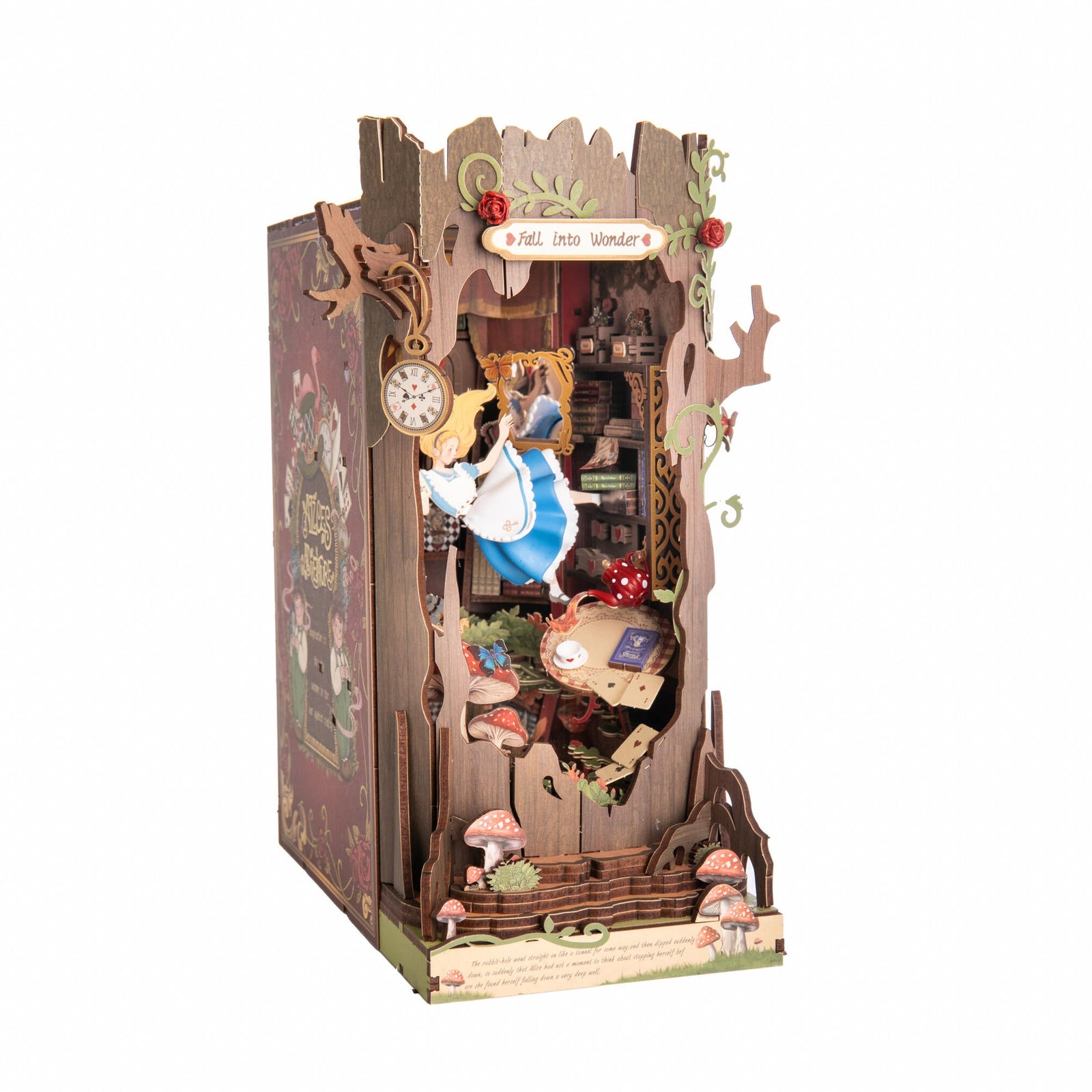 Decorative book nook model kit with animated scene of Alice in Wonderland on a white background