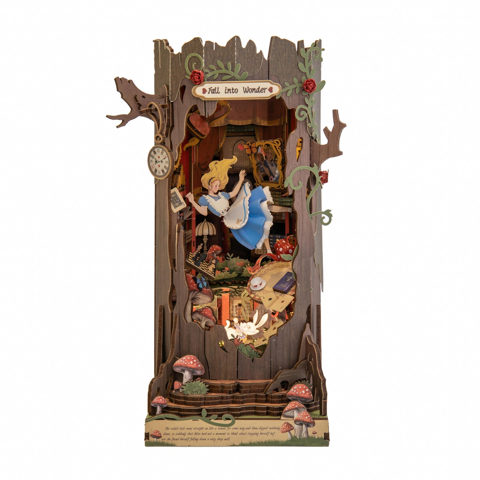 Decorative book nook model kit with animated scene of Alice in Wonderland on a white background