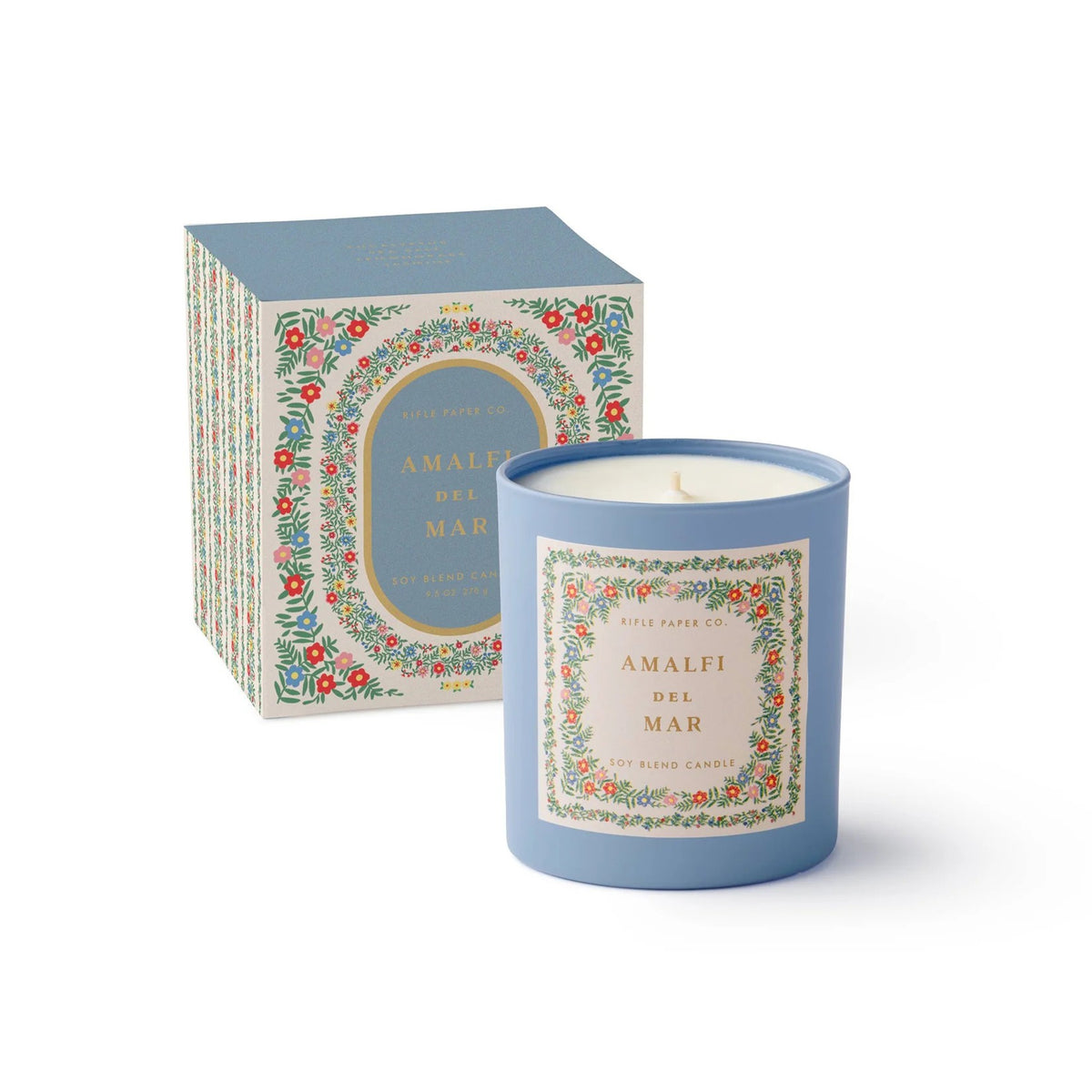 Candle with decorative packaging on a white background