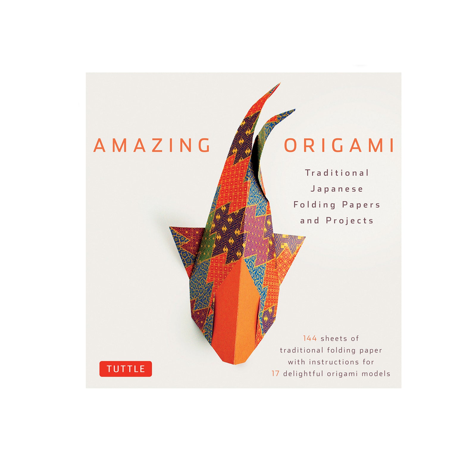 Origami book with colorful fish model on a white background