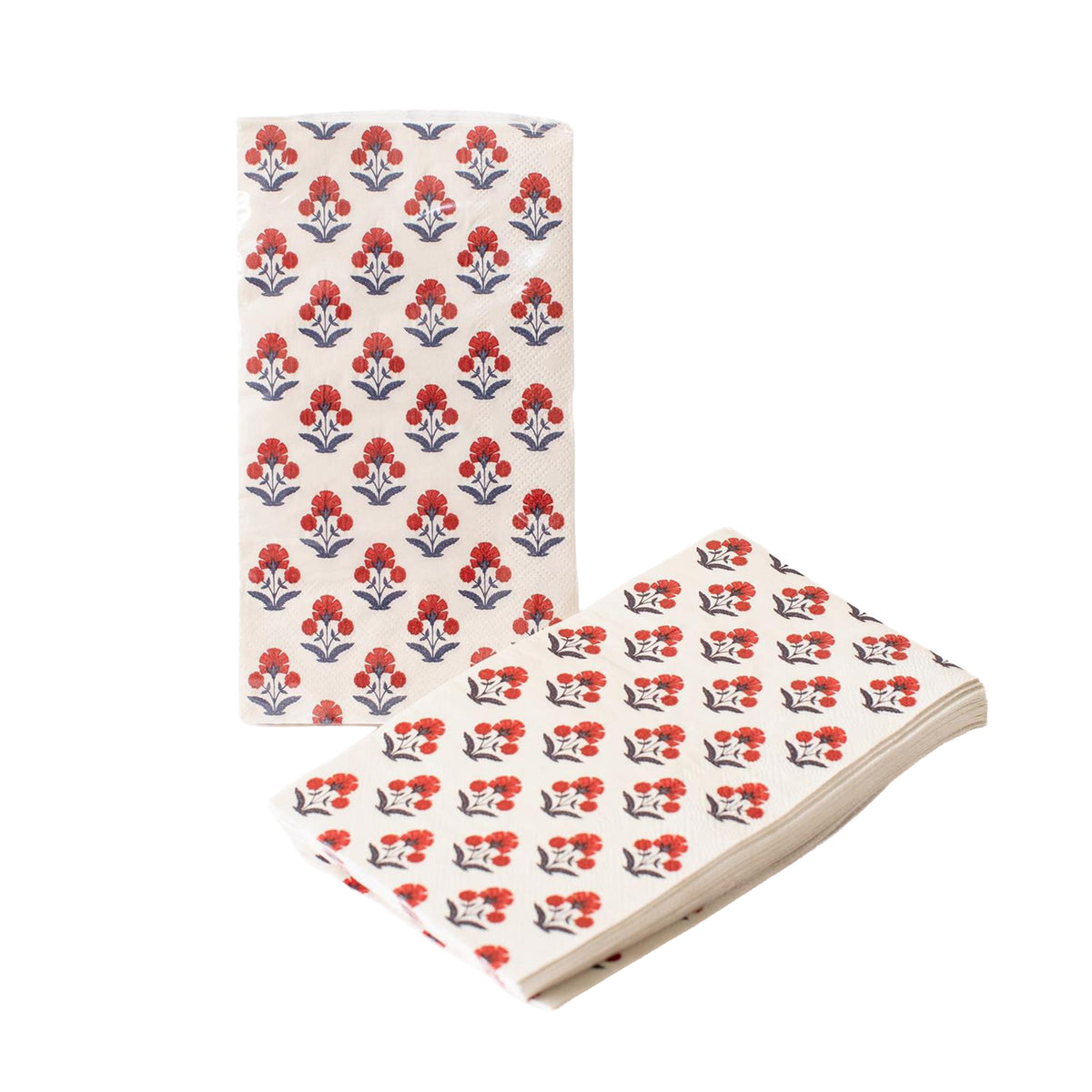 Two folded paper guest towels with a floral pattern on a white background