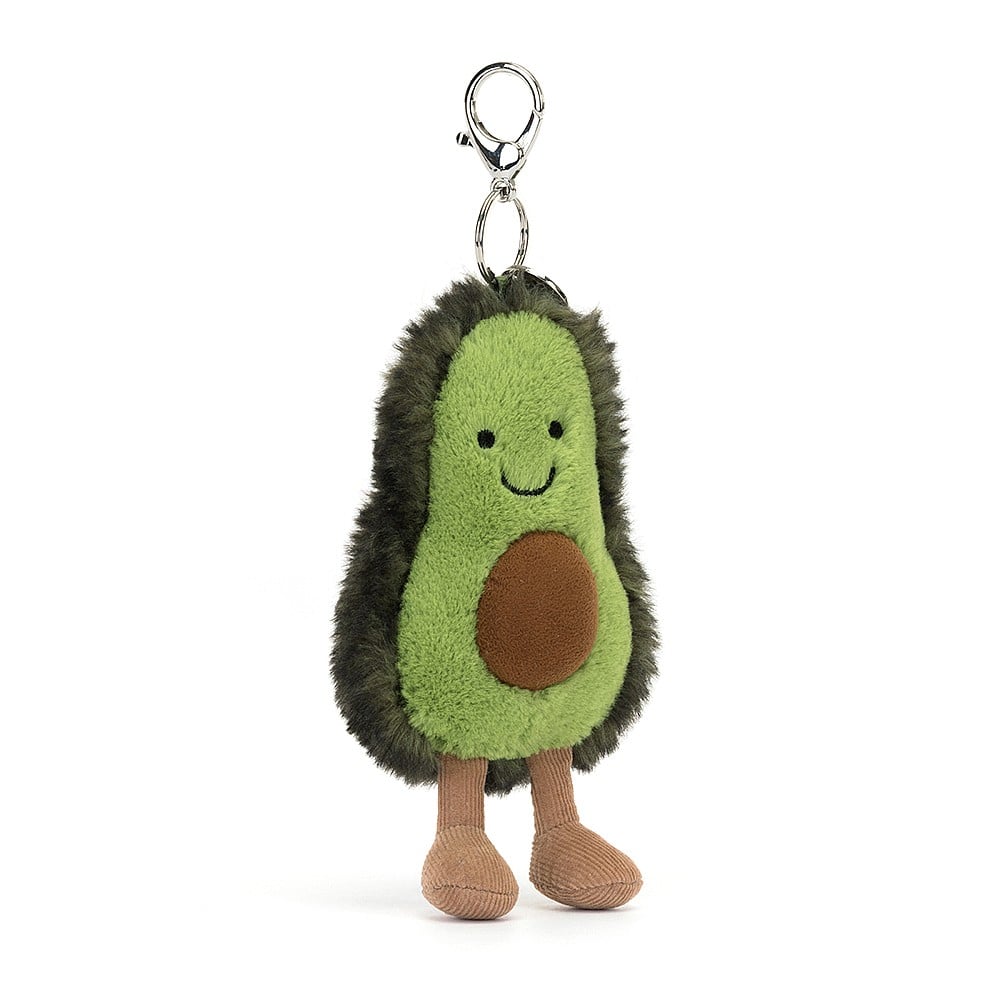 Amuseable Avocado Bag Charm is beautifully plump with a chunky suedette stone. With a bold green tummy and tufty shell, toffee cord boots and a Jellycat disc, this smiley fruit is looking delicious. Dimensions: 7" x 4" Recommended for 3 years + due to small parts. 
