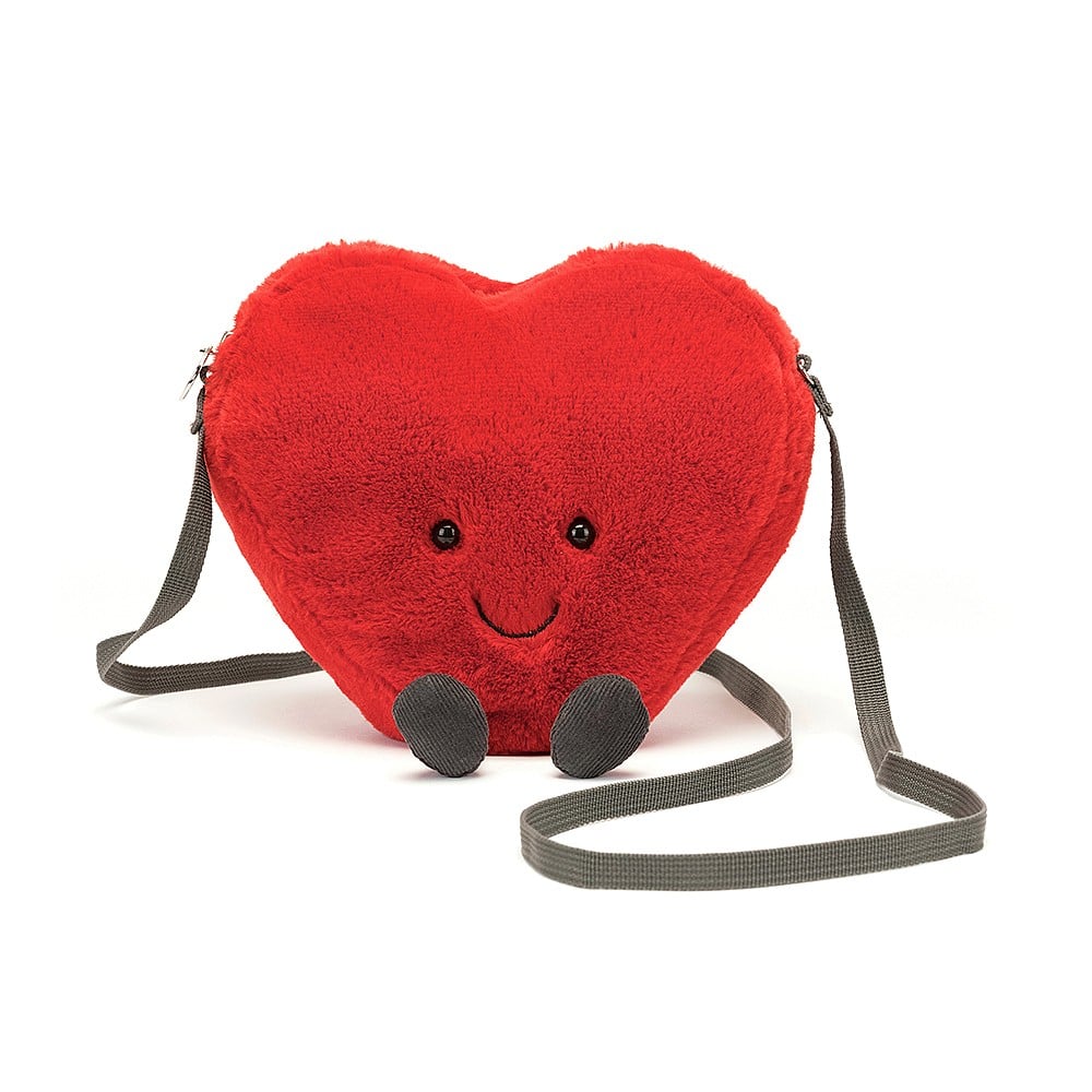 Every day can be Valentine's with Amuseable Heart Purse! This huggable heart has soft scarlet fur and plenty of room to hold all the things you love. With a strong, cross-body webbing strap, waggly cord boots and a cheerful smile, this bonny bag shows storing is caring! 7" x 7" Strap length: 46". 3+ due to long strap.