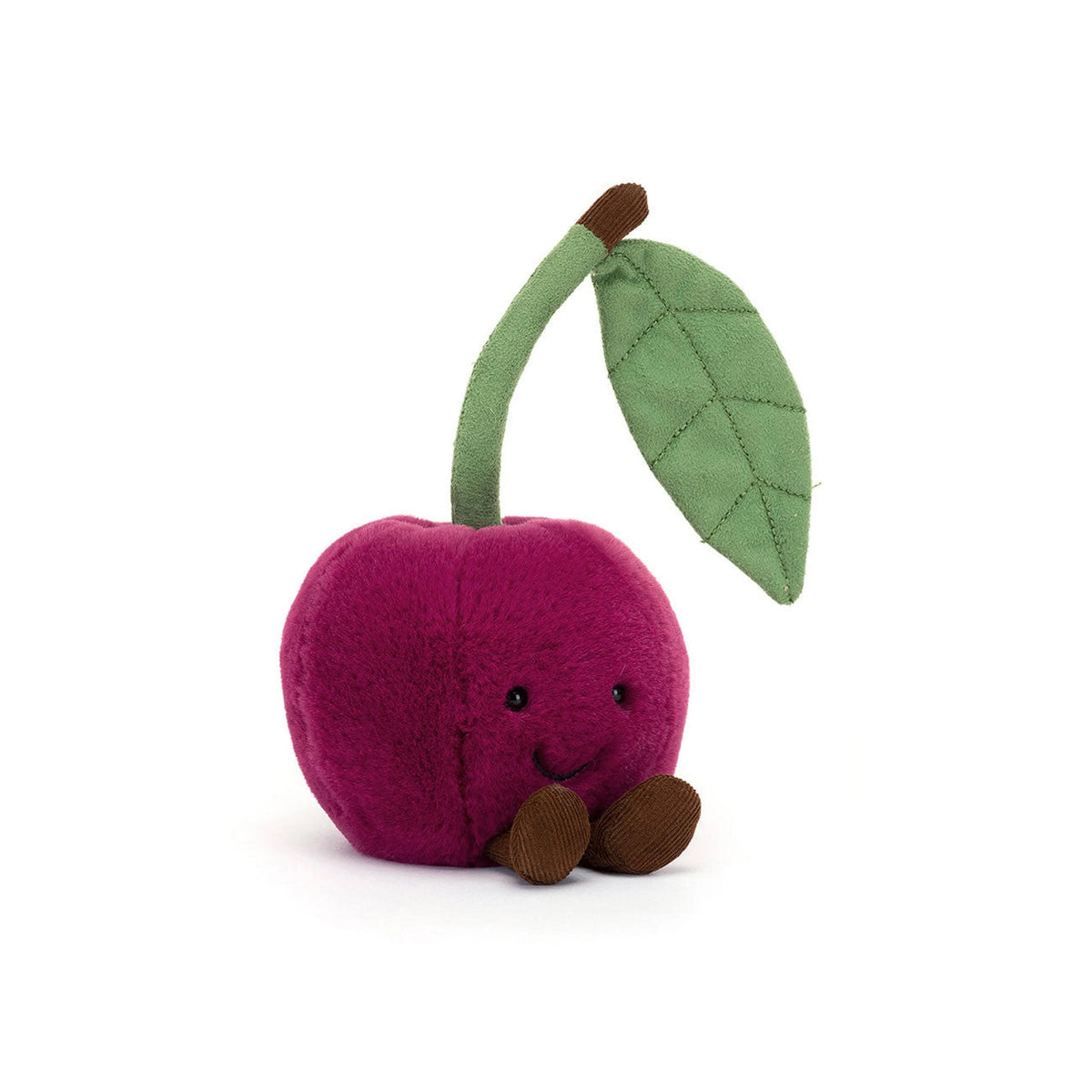Plush toy cherry with a leaf on a white background