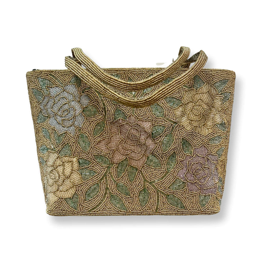 Beautiful handbag inspired by gaudi design embellished with gold flowers,  white, skyblue, detailed on Craiyon