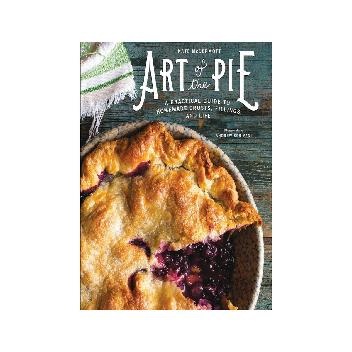 The front cover of the book 'Art of the Pie' by Kate McDermott, featuring a golden-brown baked pie with dark berry filling on a rustic blue wooden background.