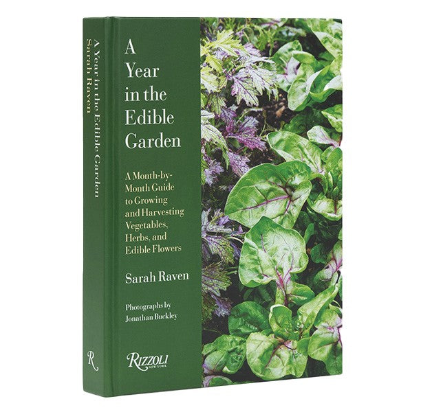 Book cover of 'A Year in the Edible Garden' with green foliage on a white background